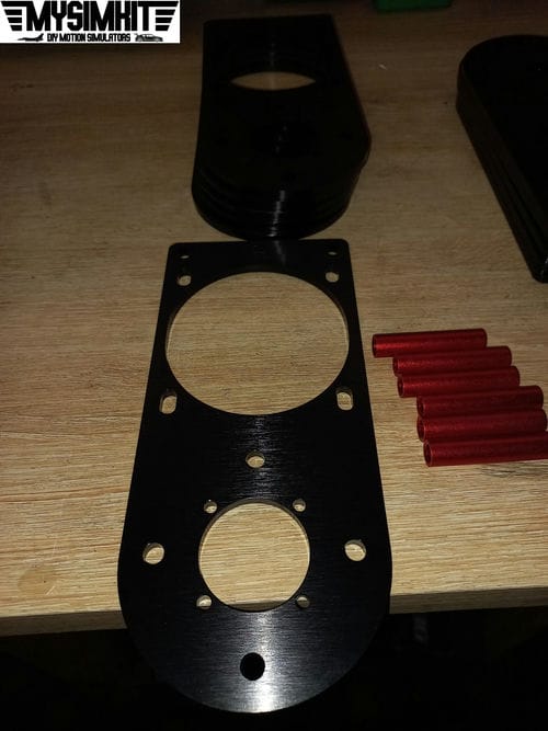 Pièce supportant le moteur et la vis à bille